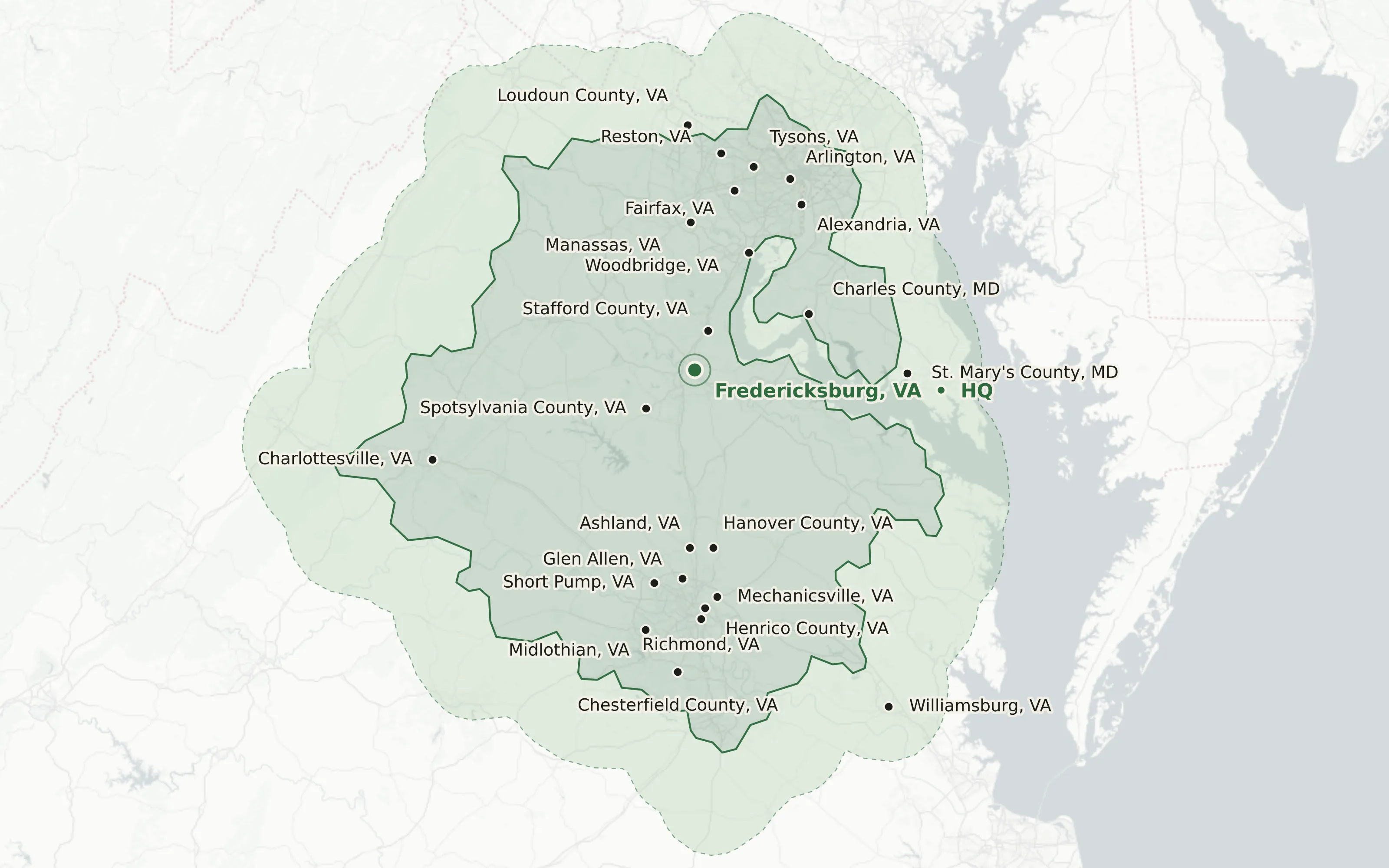 Coverage area map of the Mid-Atlantic showing a two-hour drive radius around Fredericksburg, Virginia, with labeled markers for every city and county TriTechnologies serves.